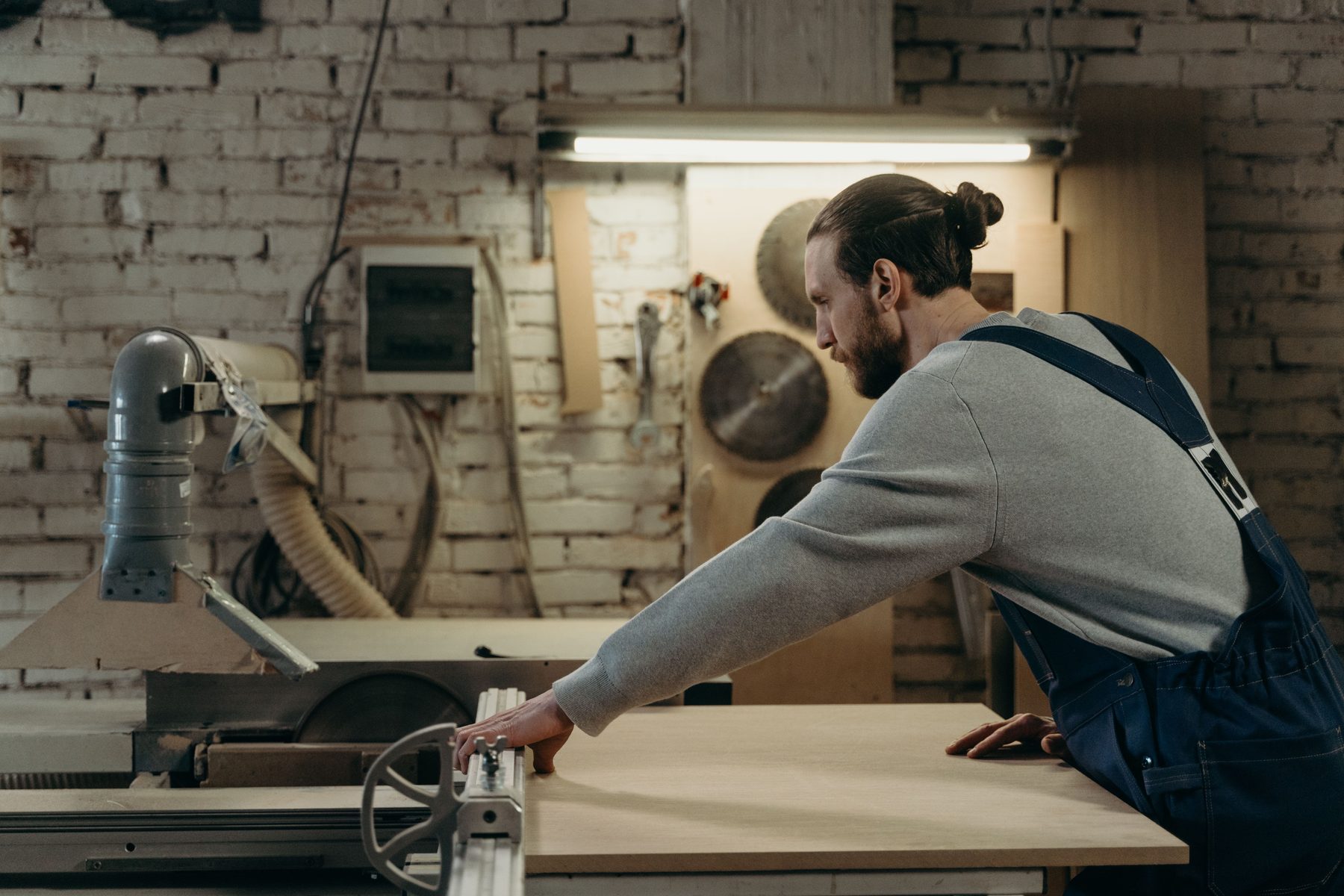 Craftsman operating machinery